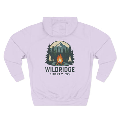 Light purple hoodie with a campfire and forest design and 'Wildridge Supply Co.' text on a white background