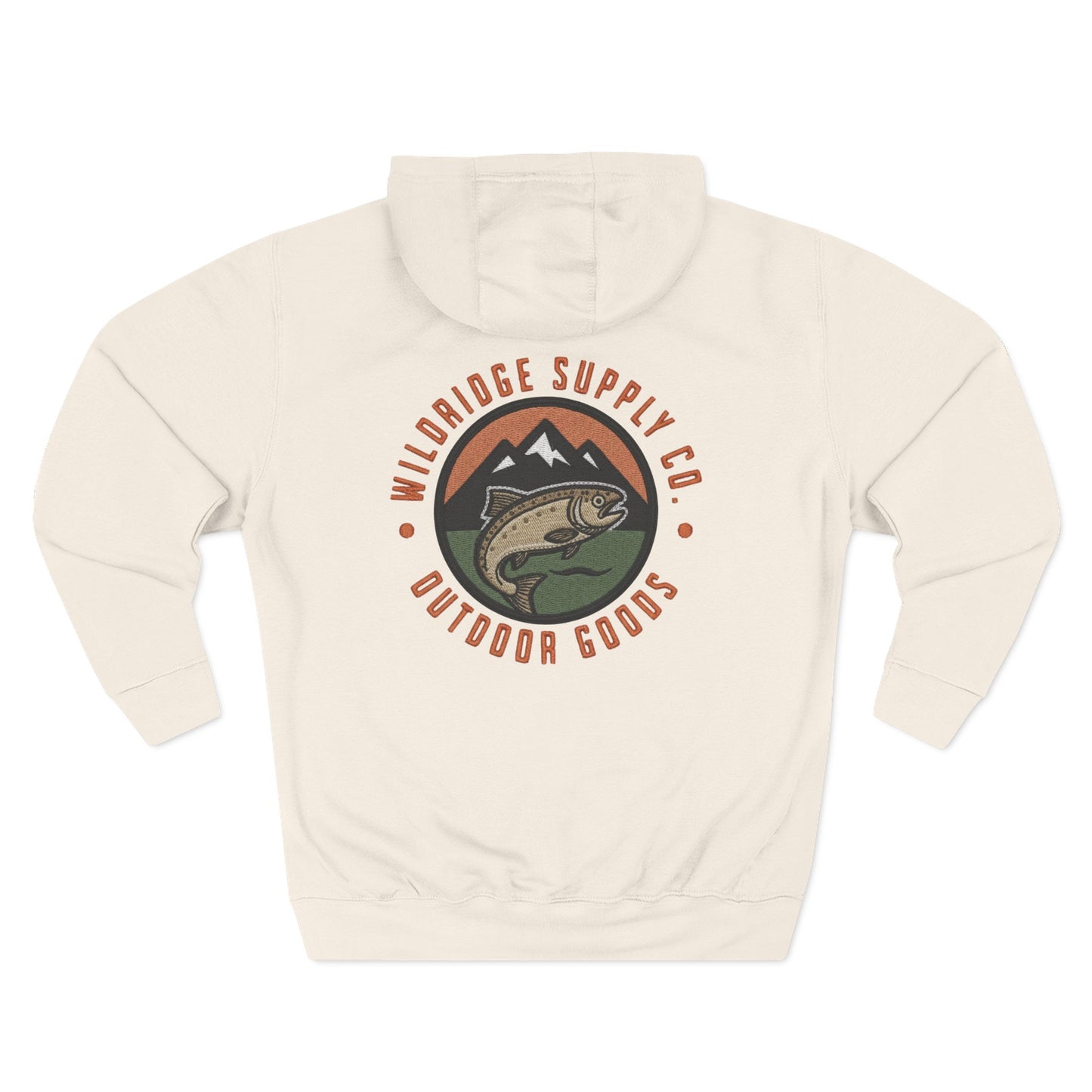 Detailed close-up of the printed patch-style trout and mountain design, with a vintage embroidered look and textured edges.