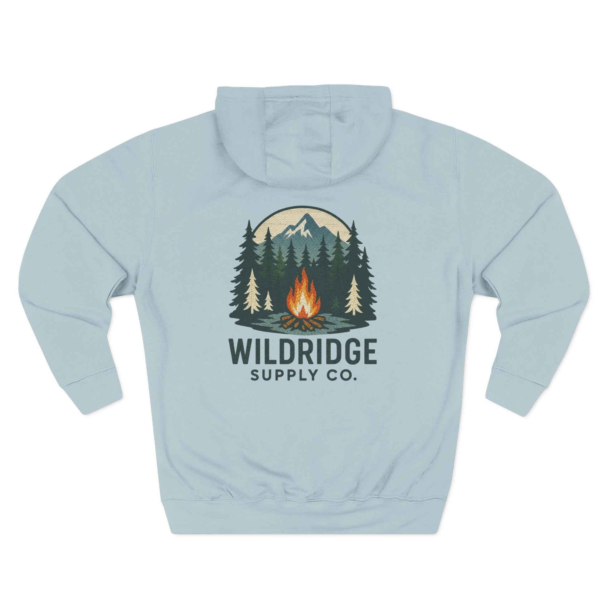 Light blue hoodie with a forest and campfire graphic and 'Wildridge Supply Co.' text on the back.