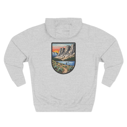 Gray hoodie with a scenic patch on a white background