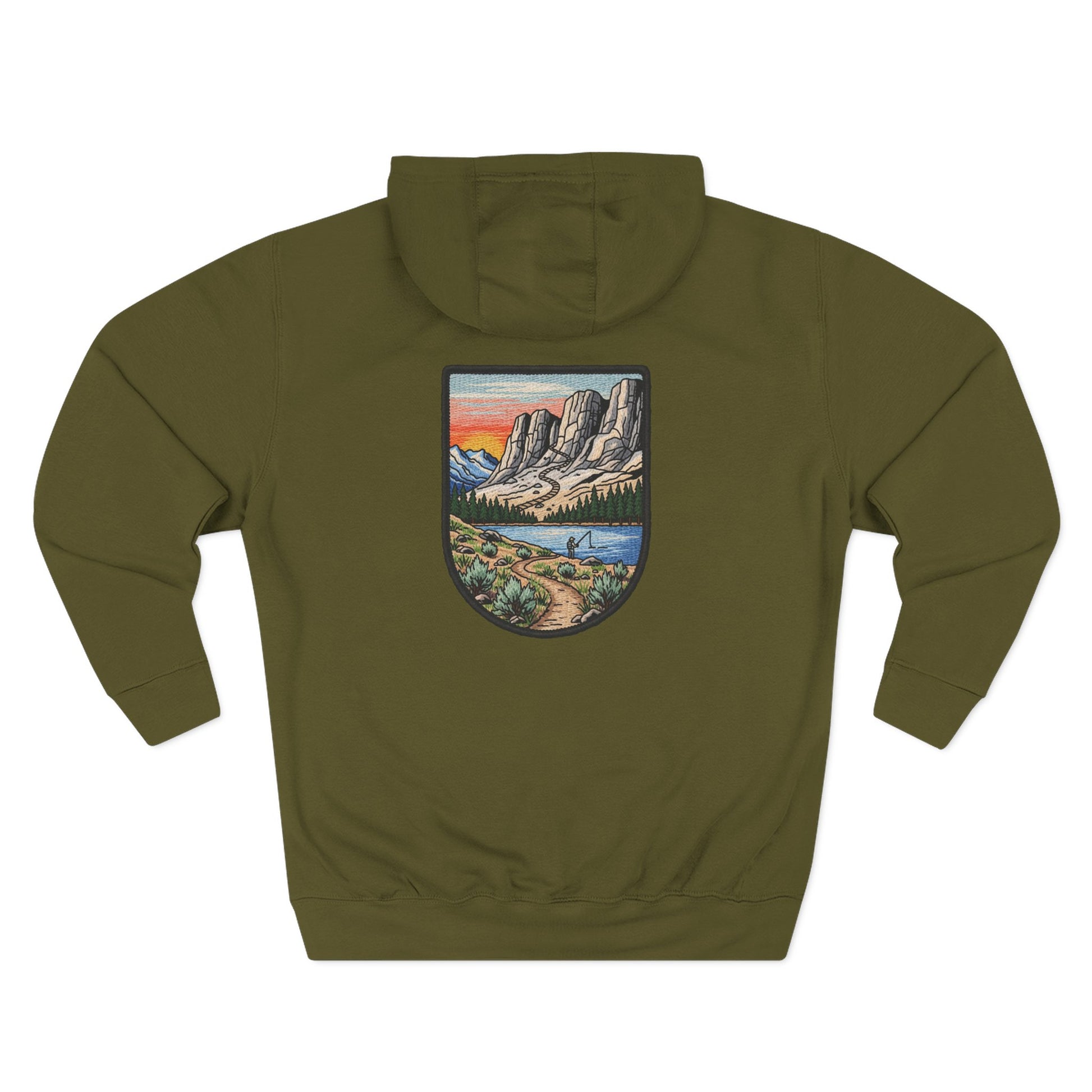 Green hoodie with a mountain landscape patch on the back against a white background