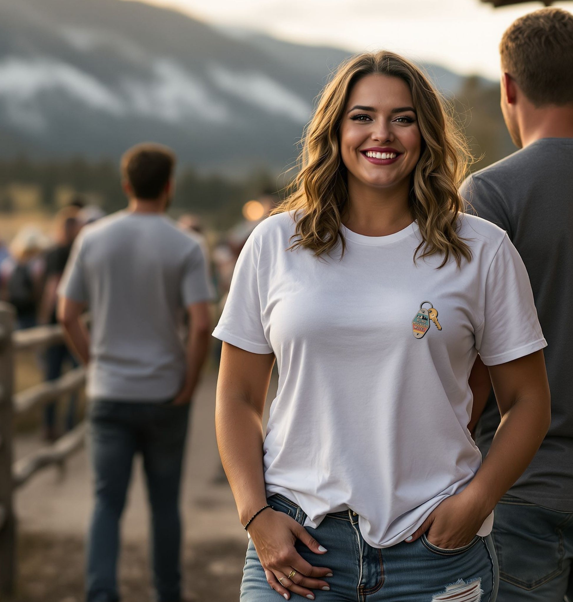 Woman wearing Wildridge Supply Co. Mountain Motel Key T-Shirt with motel key front graphic