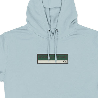 Light blue hoodie with a small logo on the chest against a white background