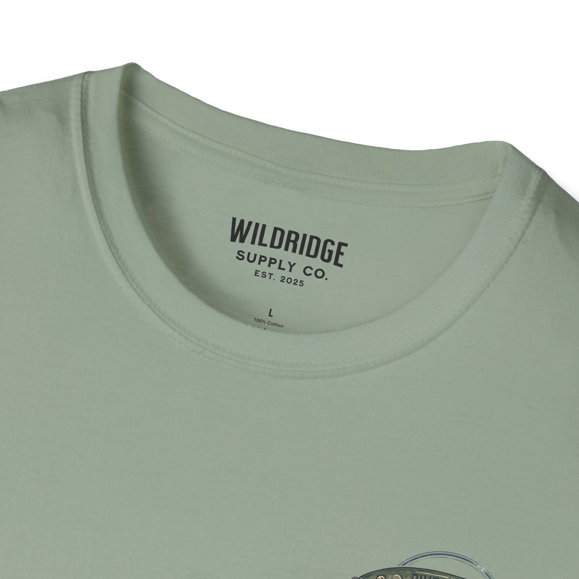Close-up of a green t-shirt with 'Wildridge Supply Co.' branding on a white background